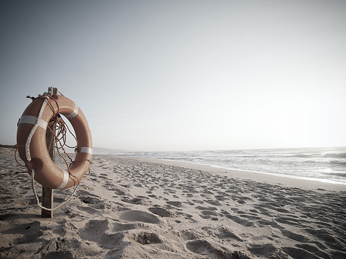 Life buoy in sunset